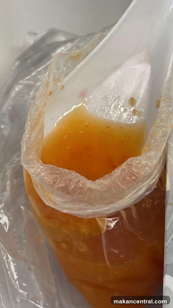 Food in plastic bag with spoon