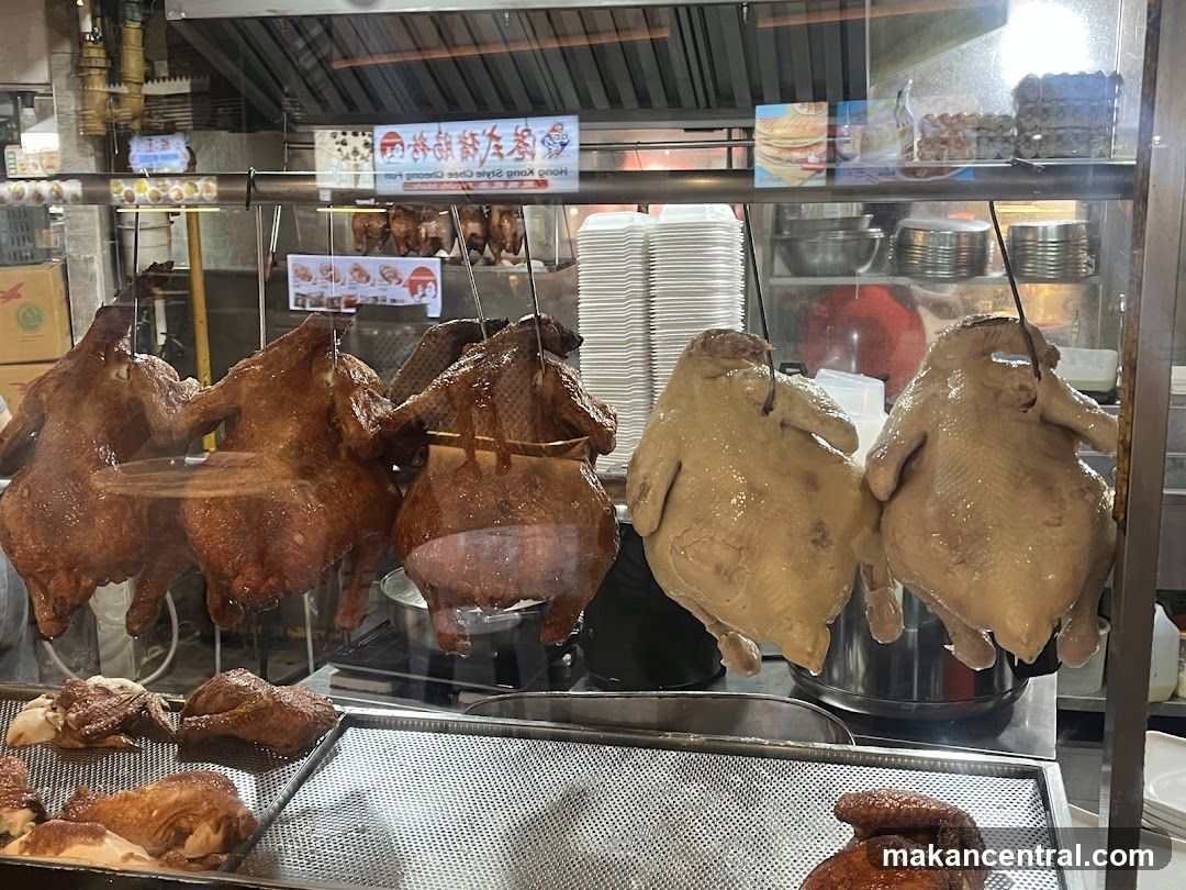 Roasted poultry display at food stall