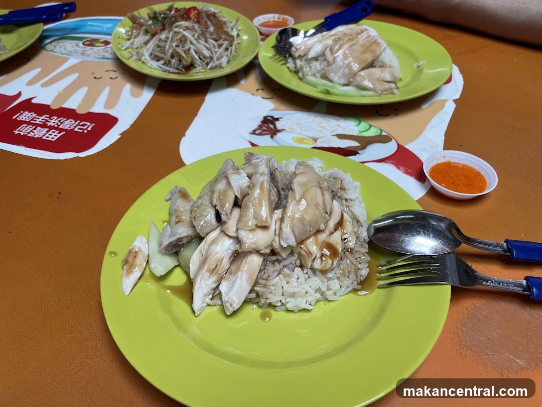 Table with Hainanese chicken rice dishes