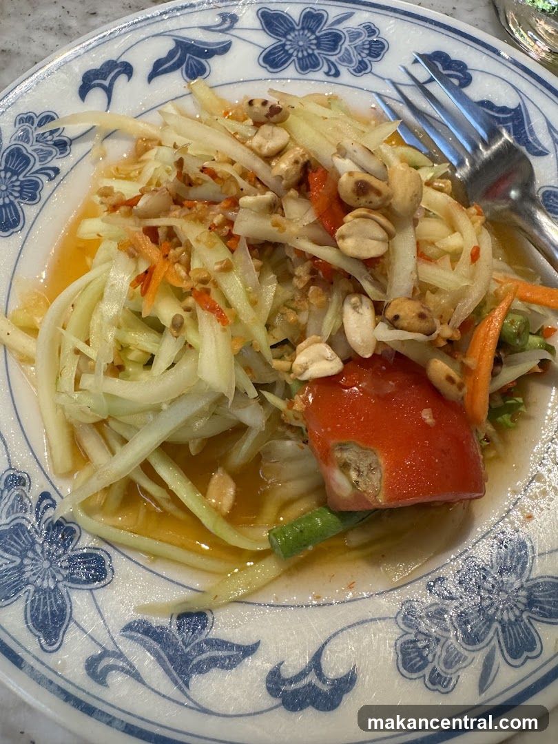 Papaya Salad on Blue-Flowered Plate