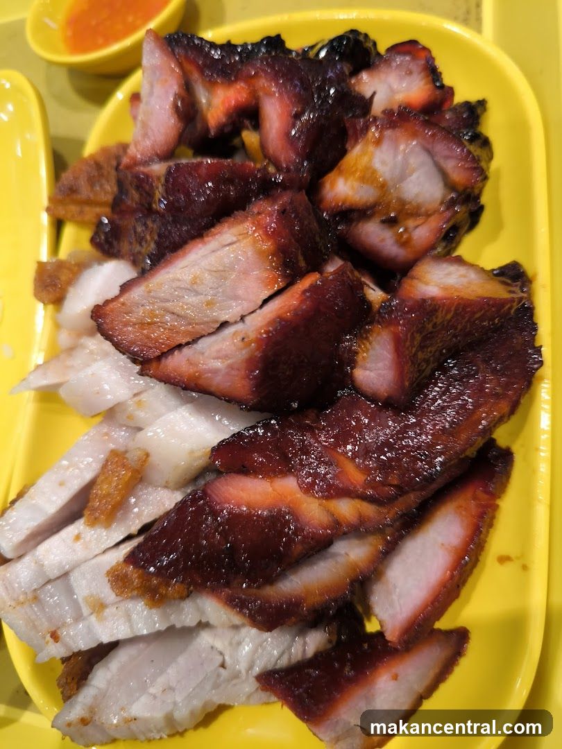 Roasted Pork Slices on Yellow Plate