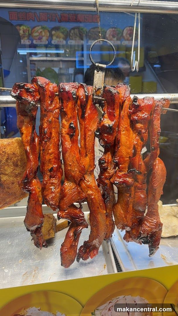 Roasted meat display at food stall