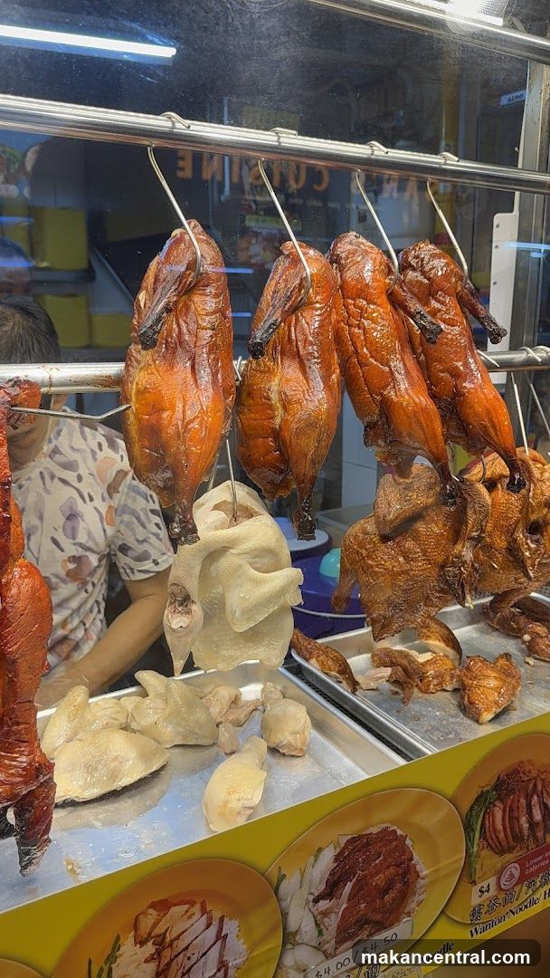Roasted ducks display at food stall