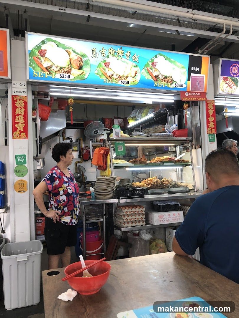 Food stall interior with customers and display