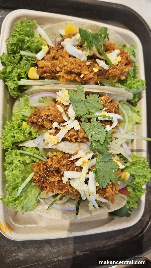 Tacos in a takeout container