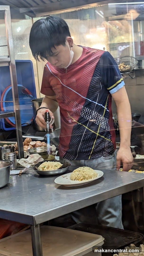 Cook preparing food in kitchen