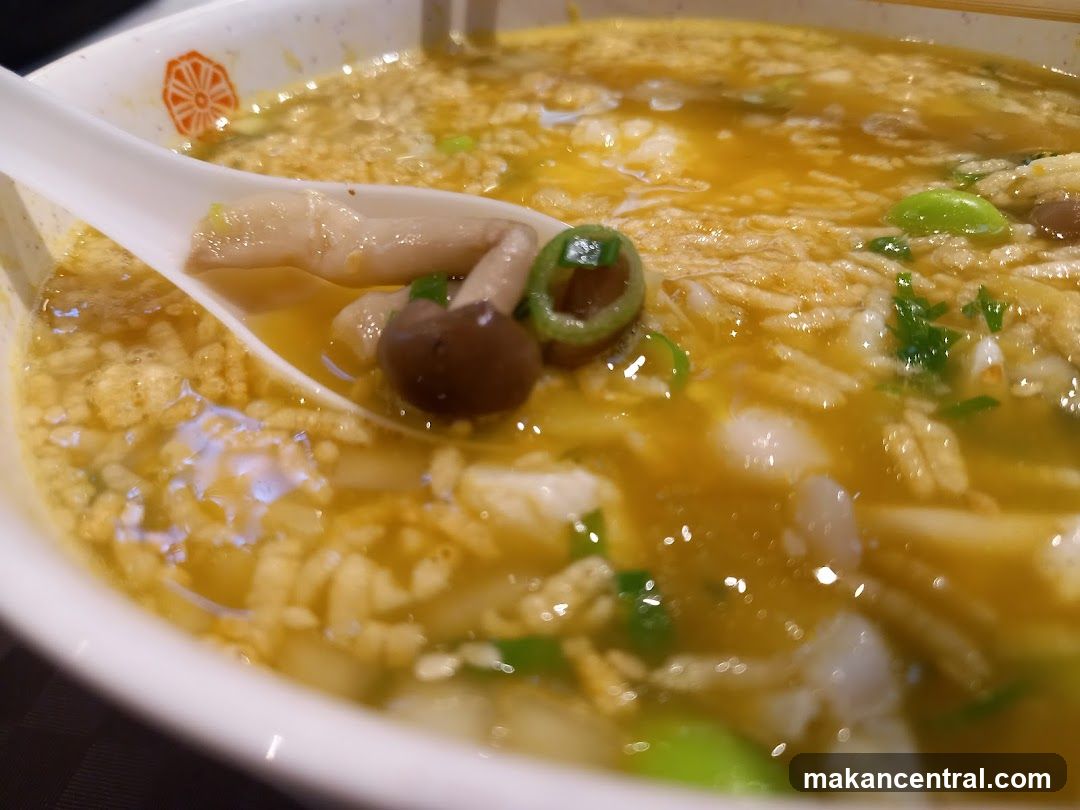 Soup in bowl with spoon