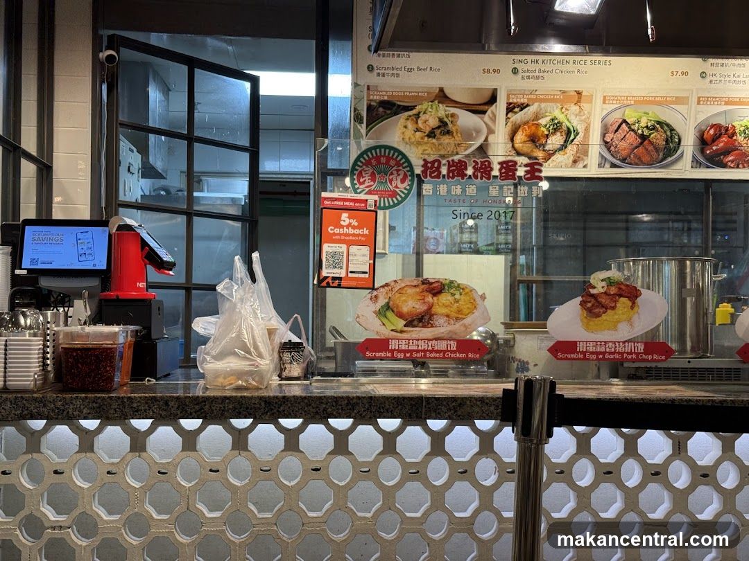 Restaurant counter with food display and payment terminal