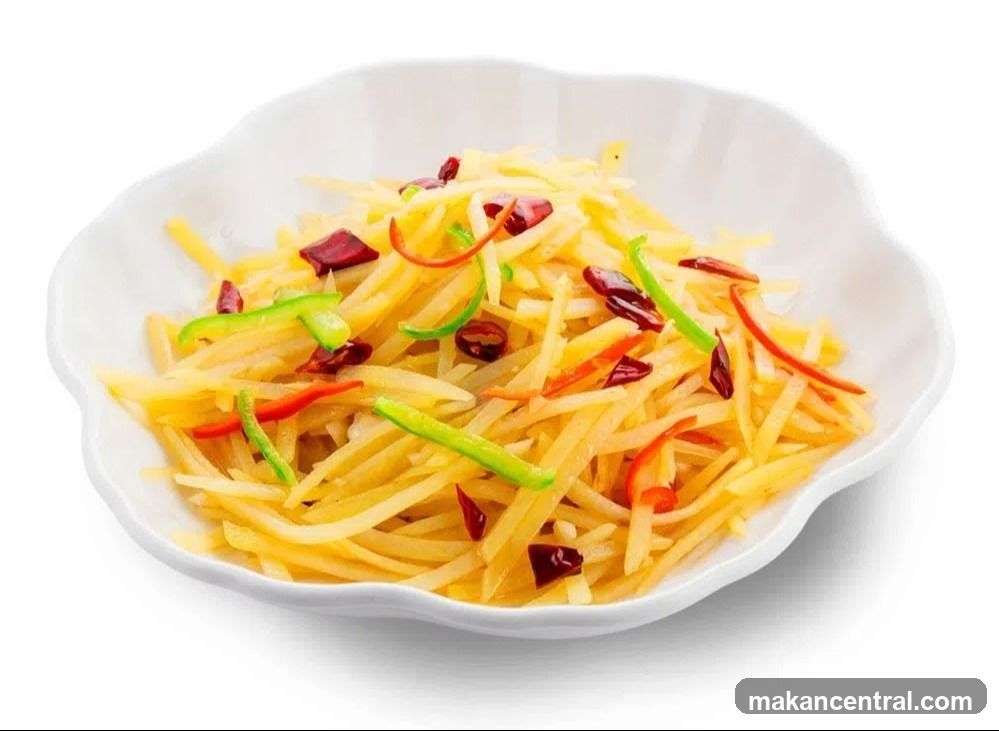 Stir-fried potatoes with chili peppers