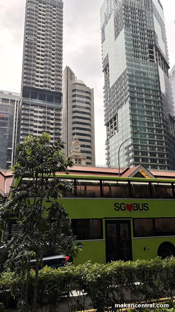 Urban street scene with bus and skyscrapers