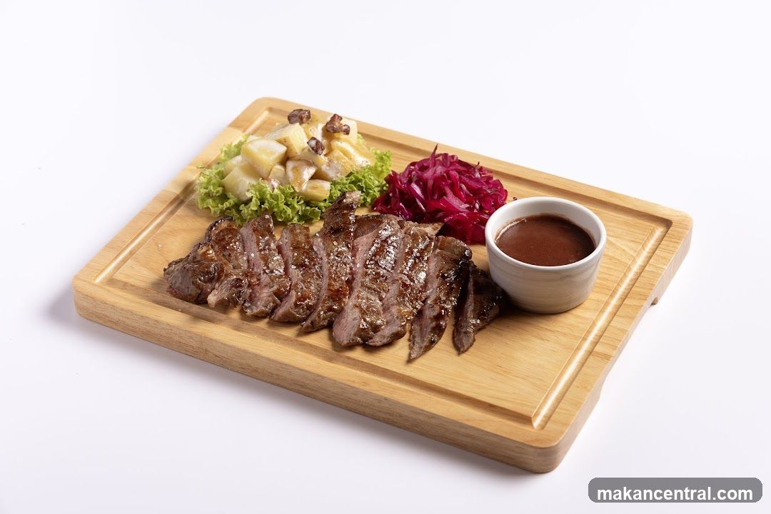 Grilled Meat Plate on Wooden Board