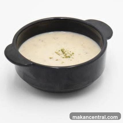Black bowl with soup