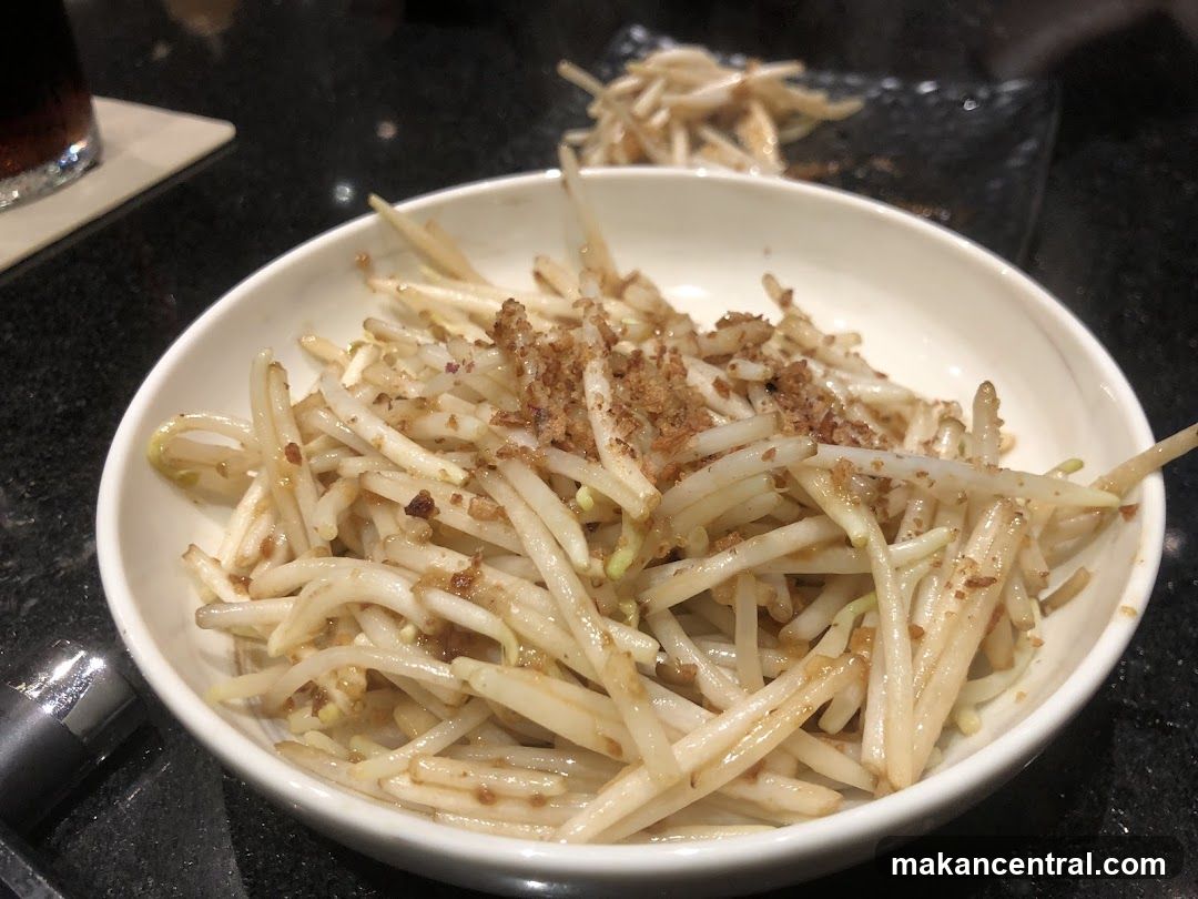 Bowl of bean sprouts with seasoning