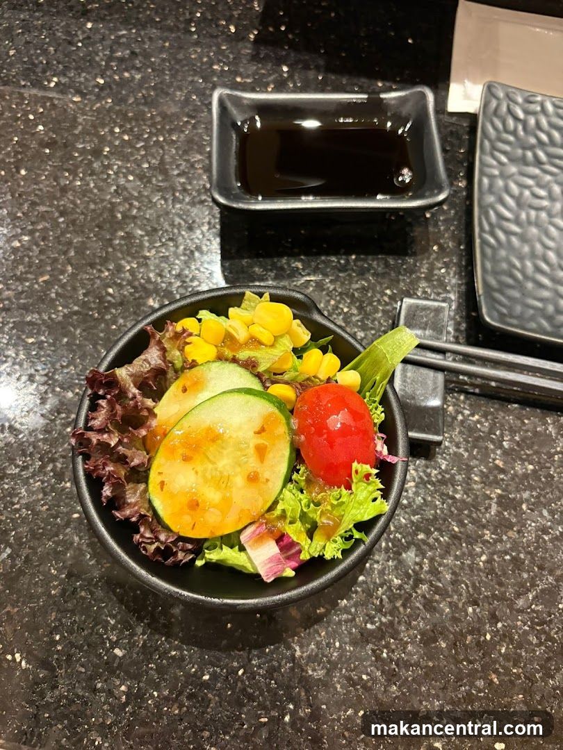 Salad and Condiment on Table