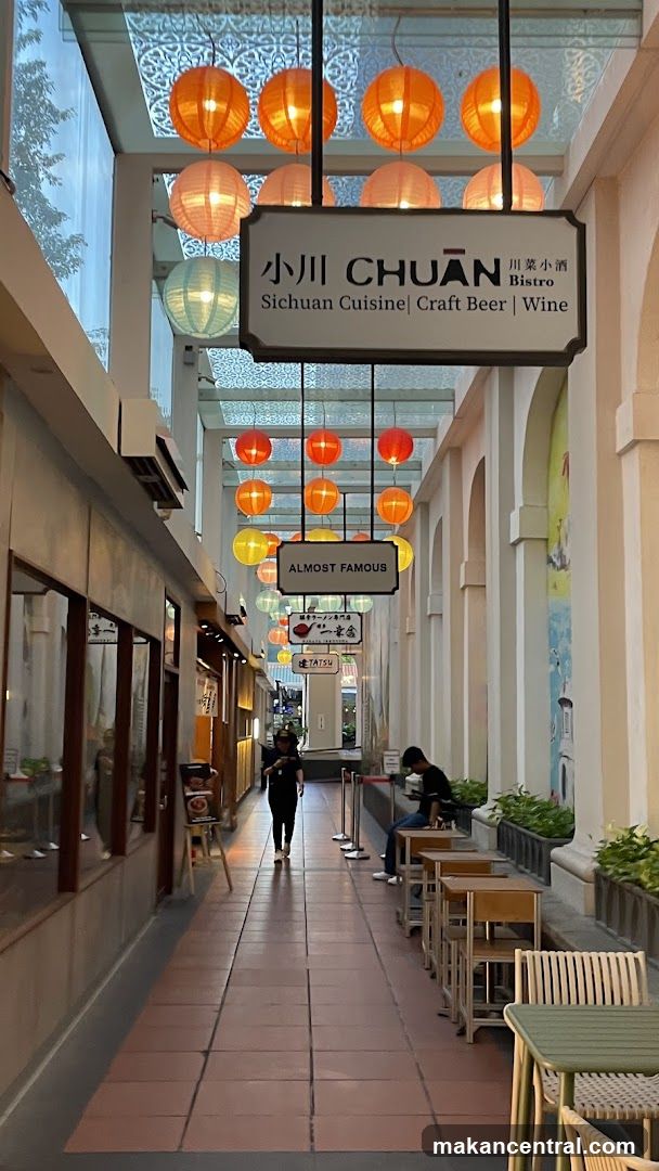 Interior of a covered walkway with dining establishments
