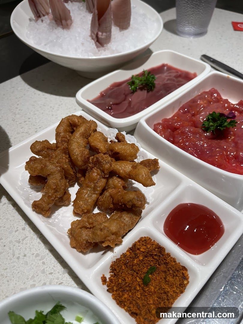 Dining Table with Seafood and Meat Dishes