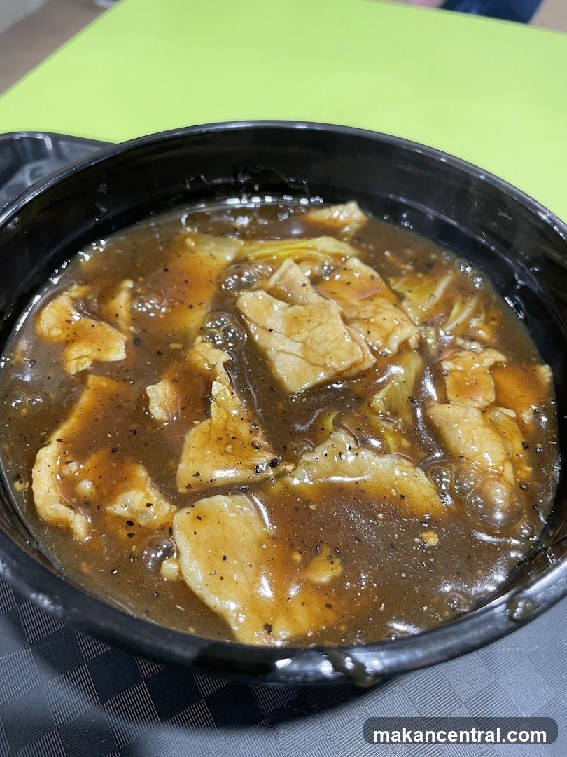 Food dish in black bowl
