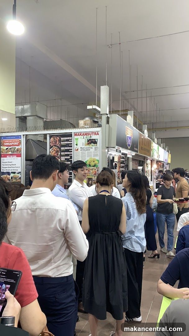 Food court interior with patrons and stalls
