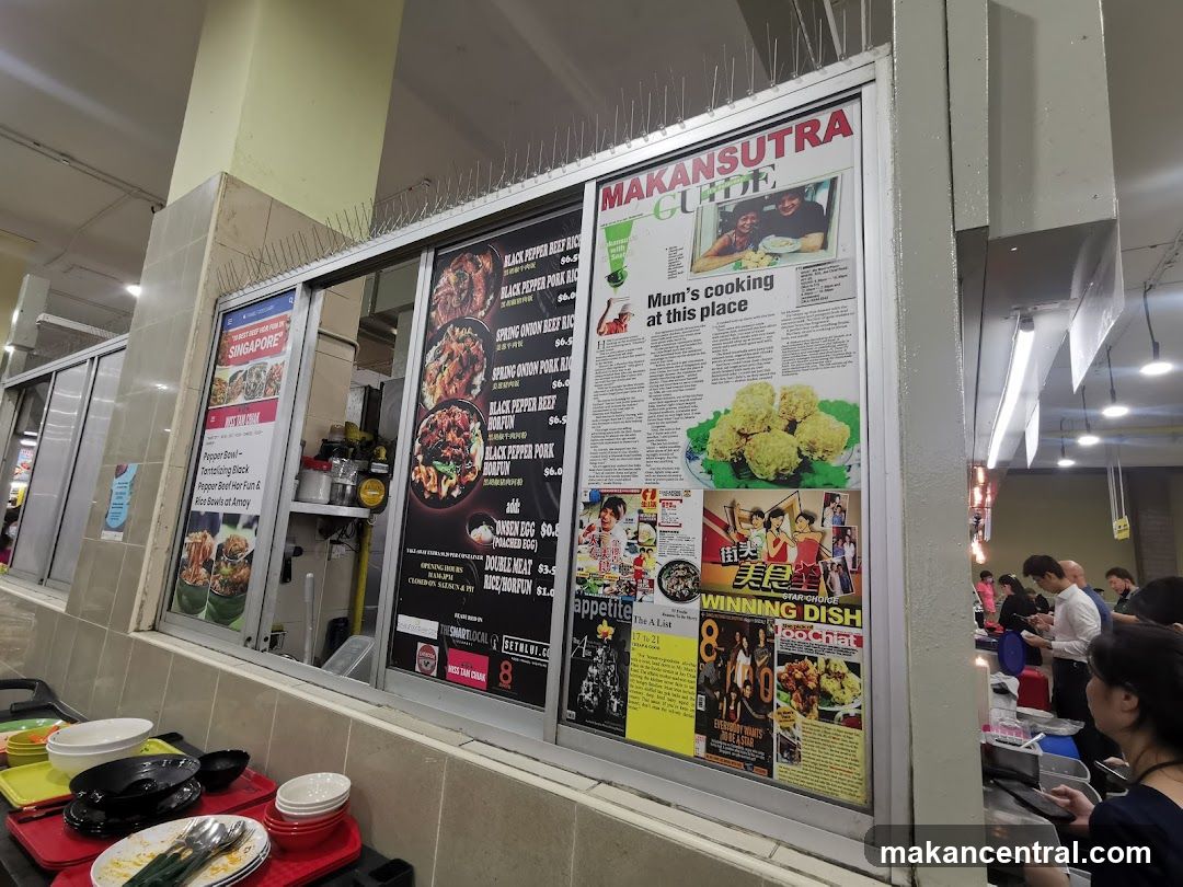 Restaurant Counter with Menu Board and Customers