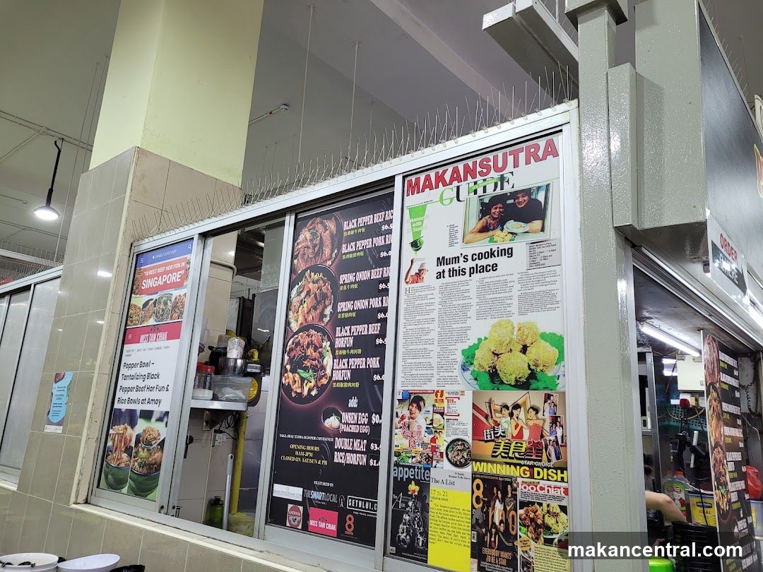Food stall storefront with printed materials