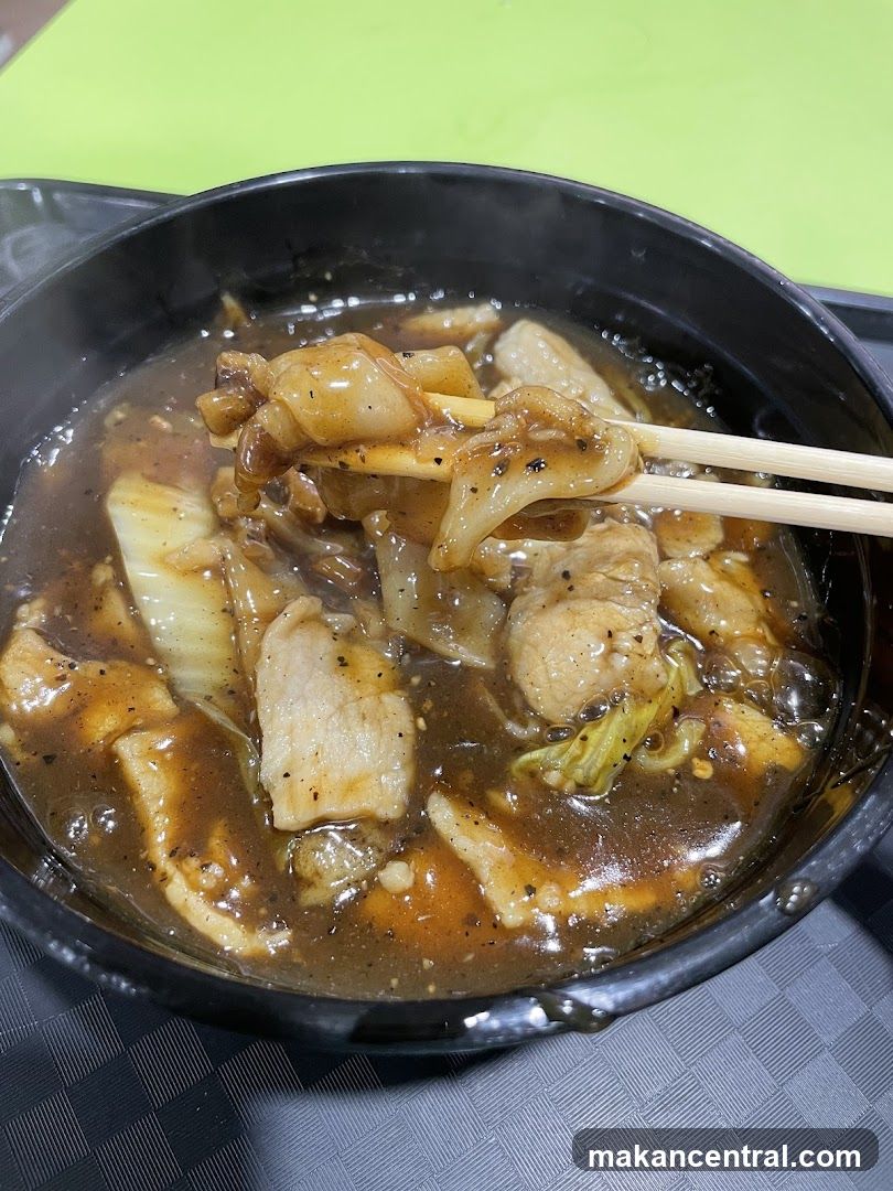 Food dish in black bowl