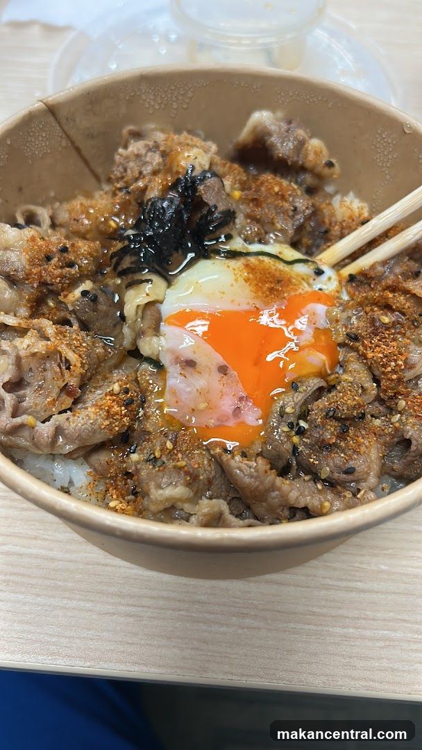 Bowl of beef donburi with egg