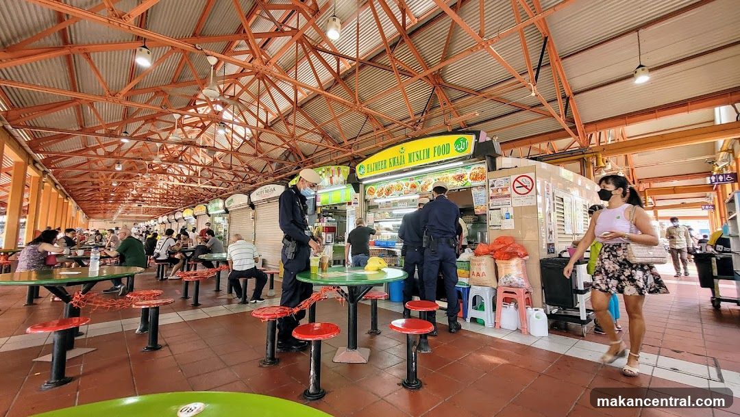 Food court interior with vendors and patrons