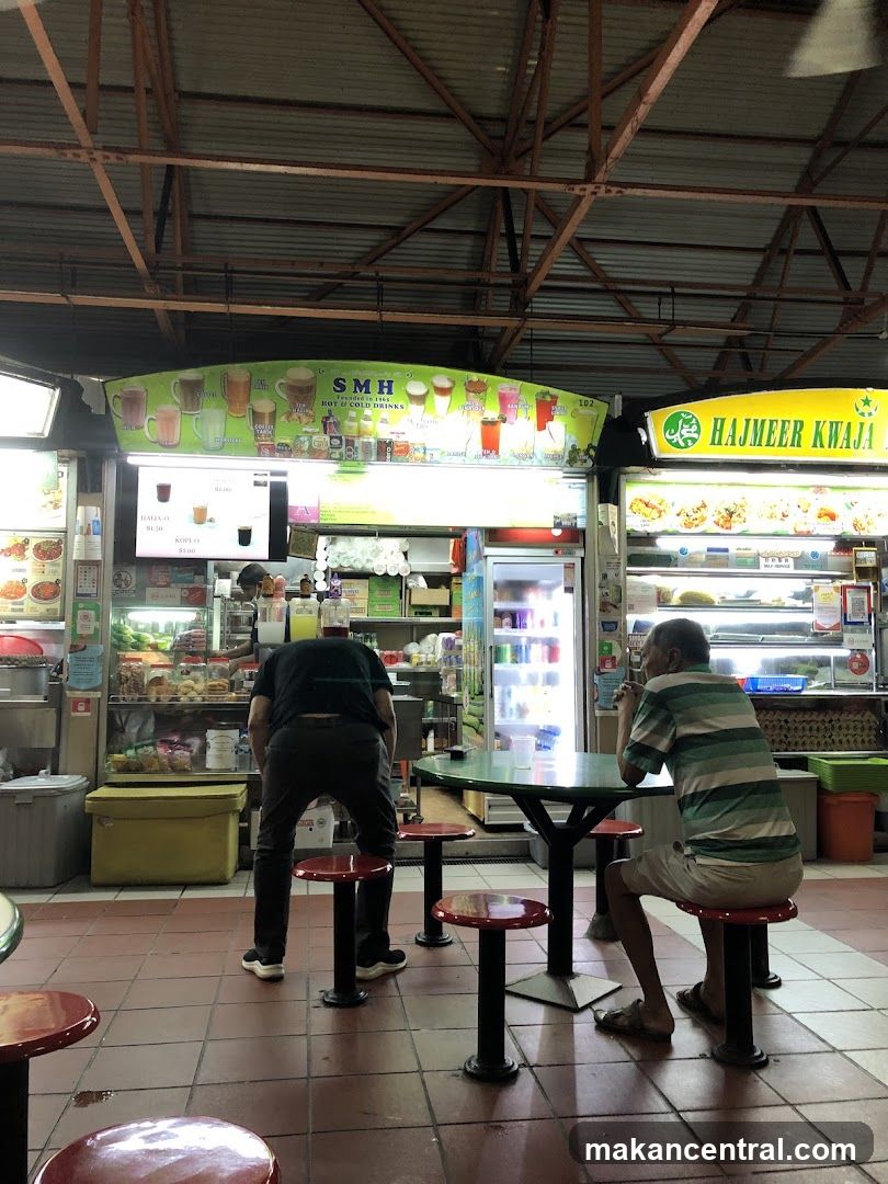Food court interior with vendors and customers