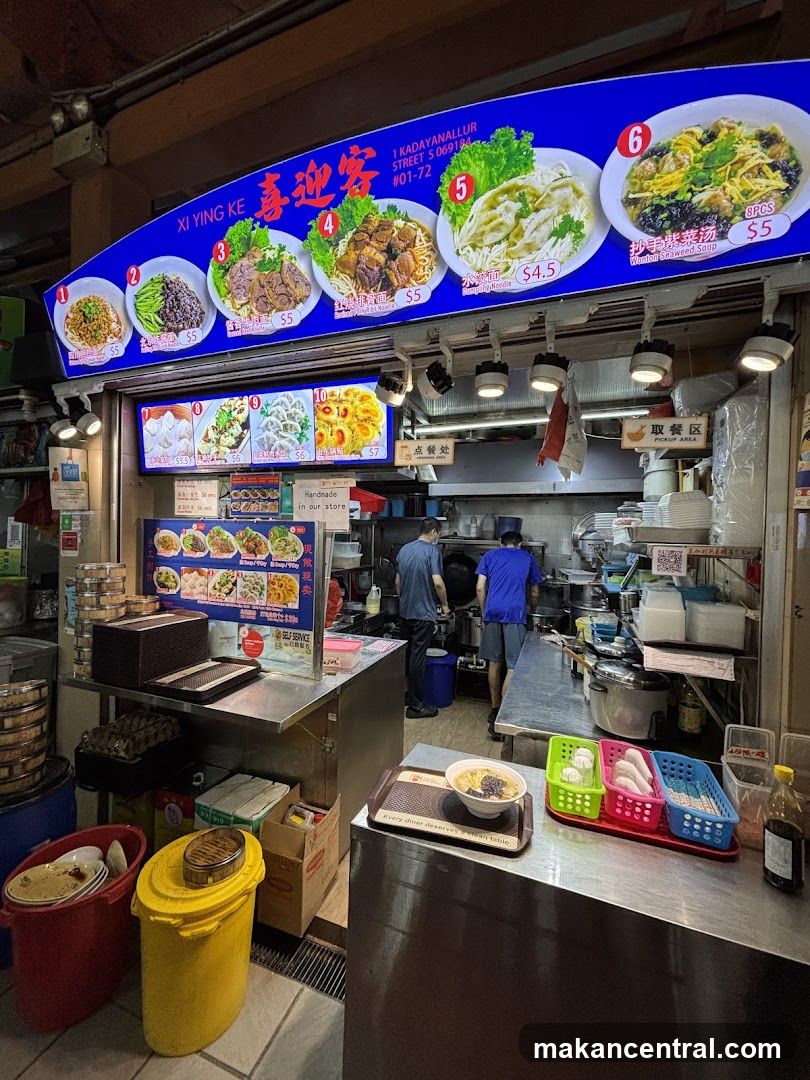 Food stall interior with staff working