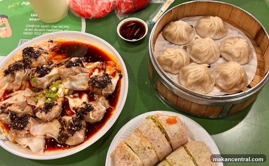Dumplings and rolls on table