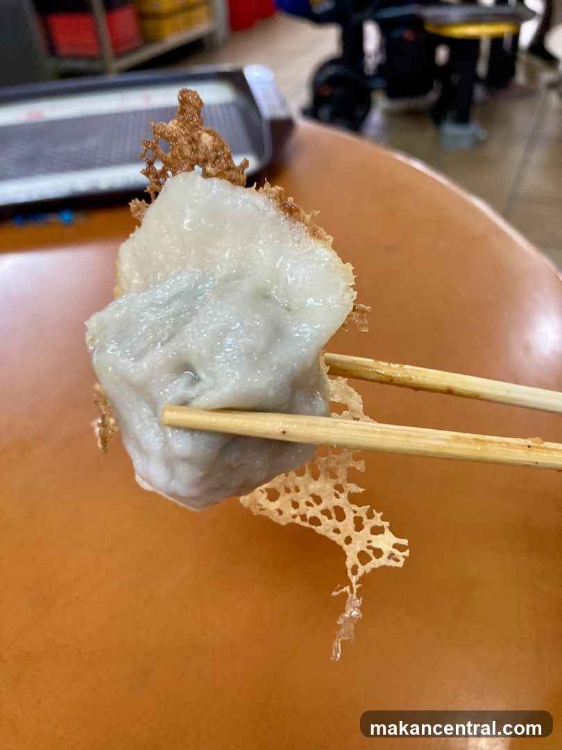 Food being held with chopsticks
