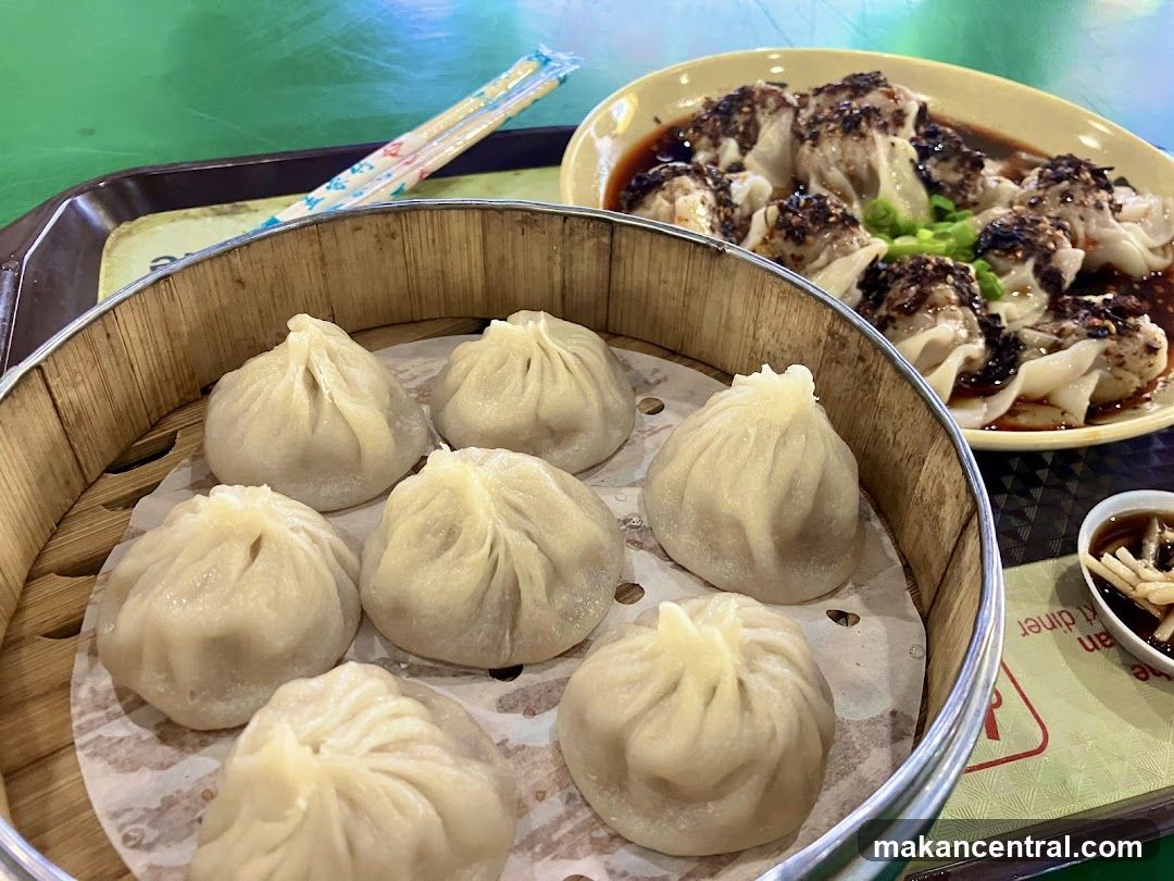 Dumplings and Sichuan-style dish