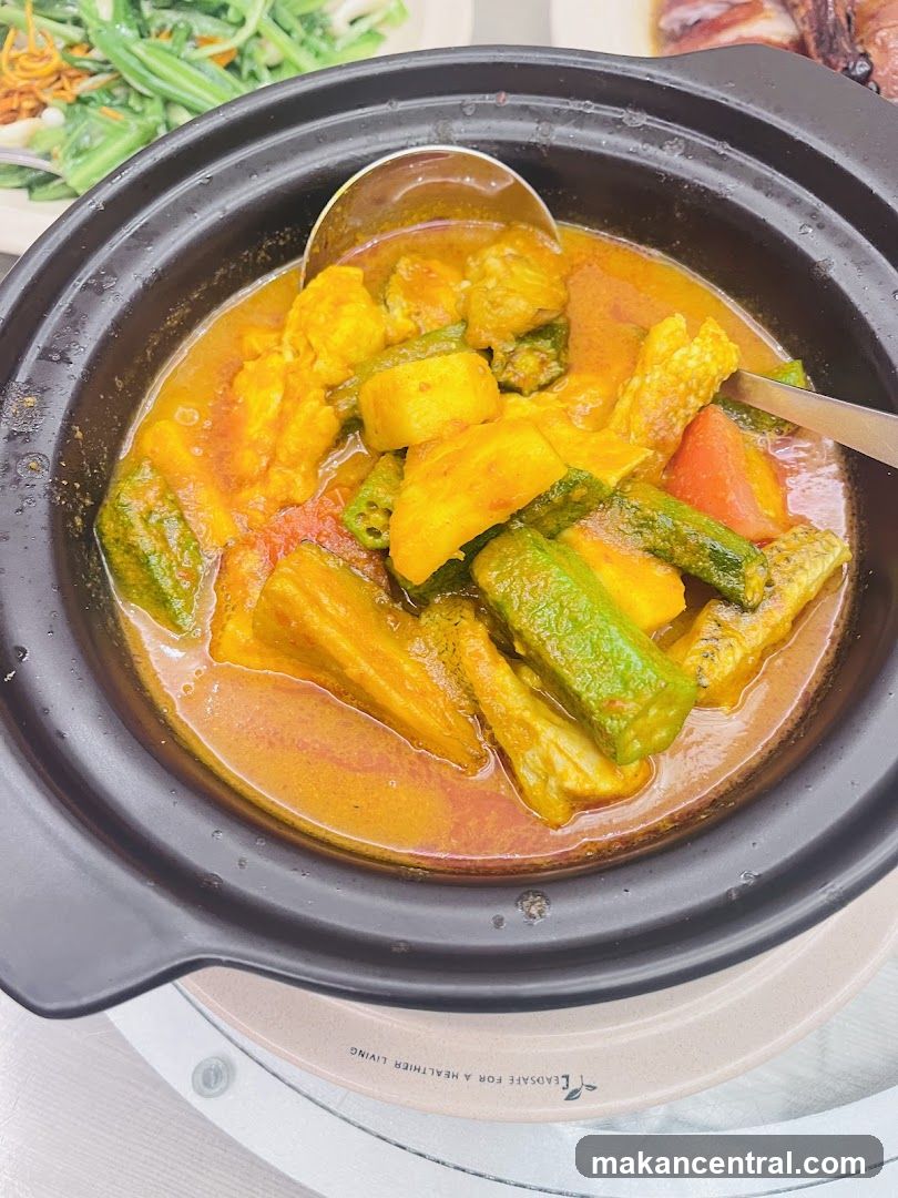 Close-up of curry dish in clay pot