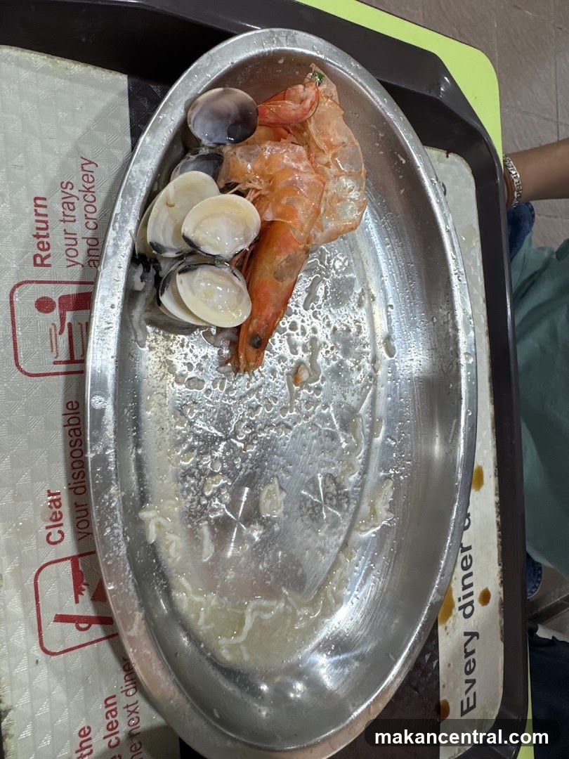 Food tray with seafood remnants