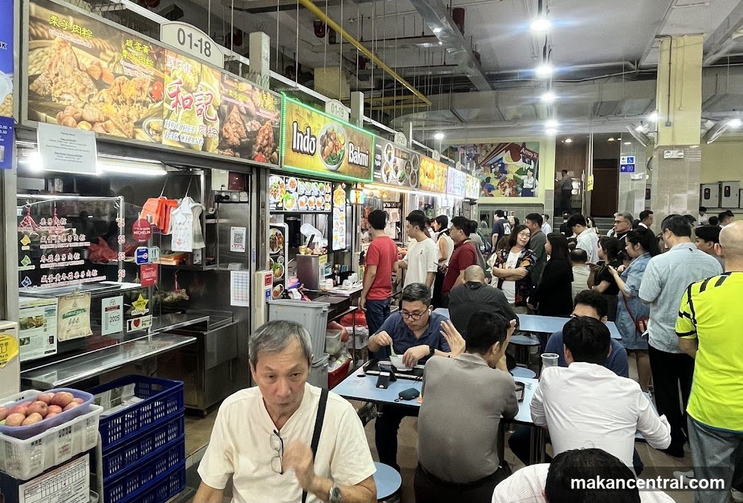 Food court interior with customers and stalls
