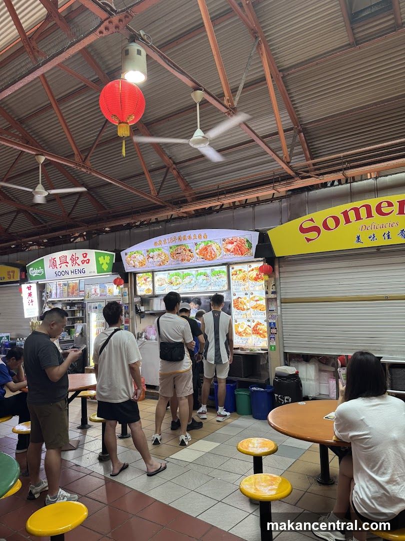 Food court interior with customers and stalls
