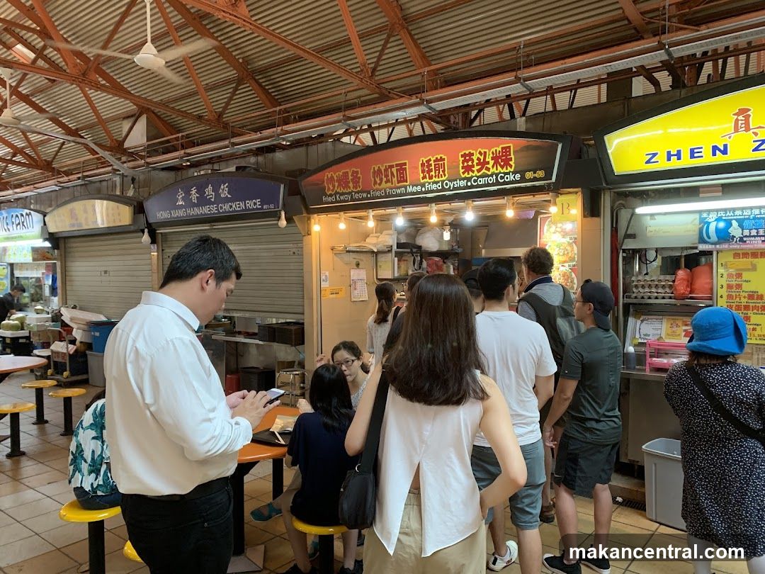 Food court interior with customers and stalls