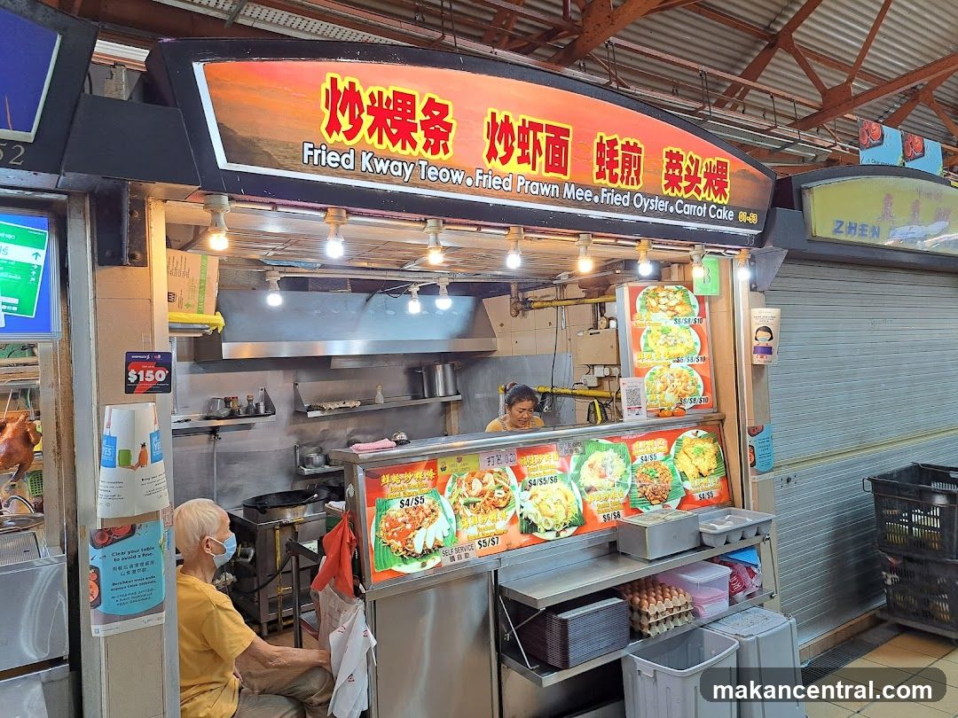 Food stall interior with signage