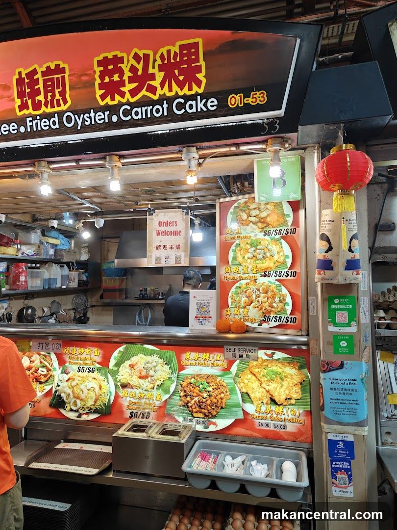 Food stall with signage and promotional materials