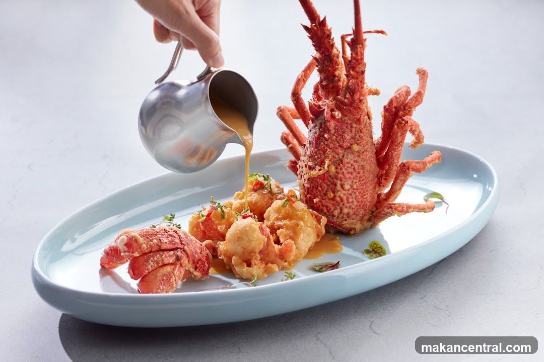 Lobster Dish Being Drizzled with Sauce