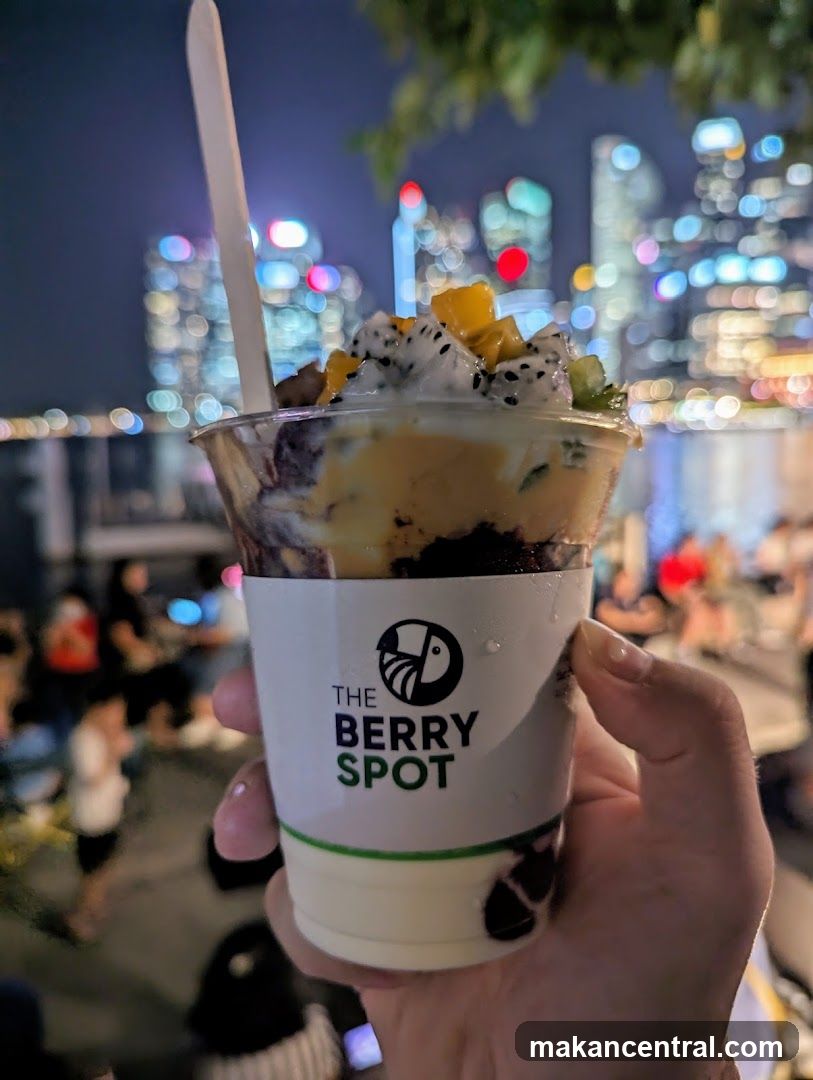 Berry Spot Dessert Cup Held at Night