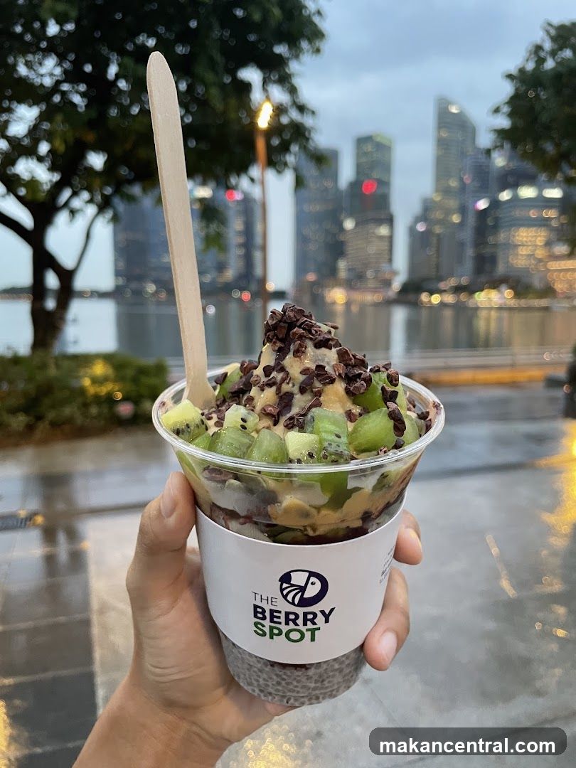Berry Smoothie Cup Held in Hand