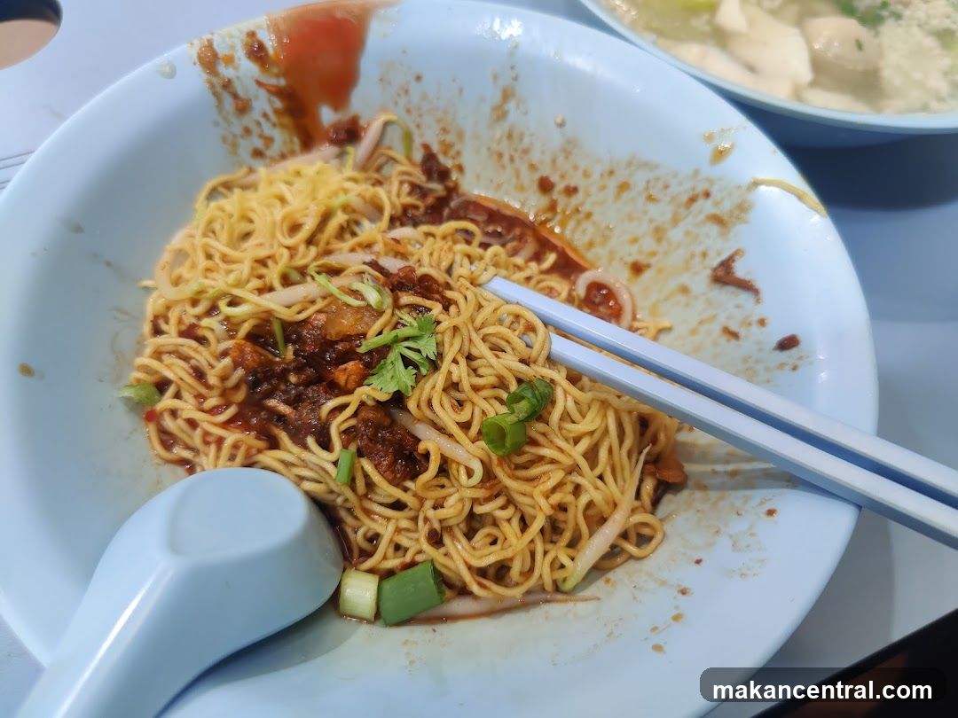 Noodles with sauce and garnishes