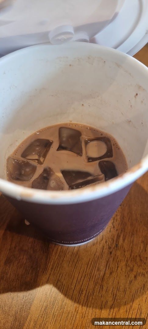 Iced beverage in paper cup