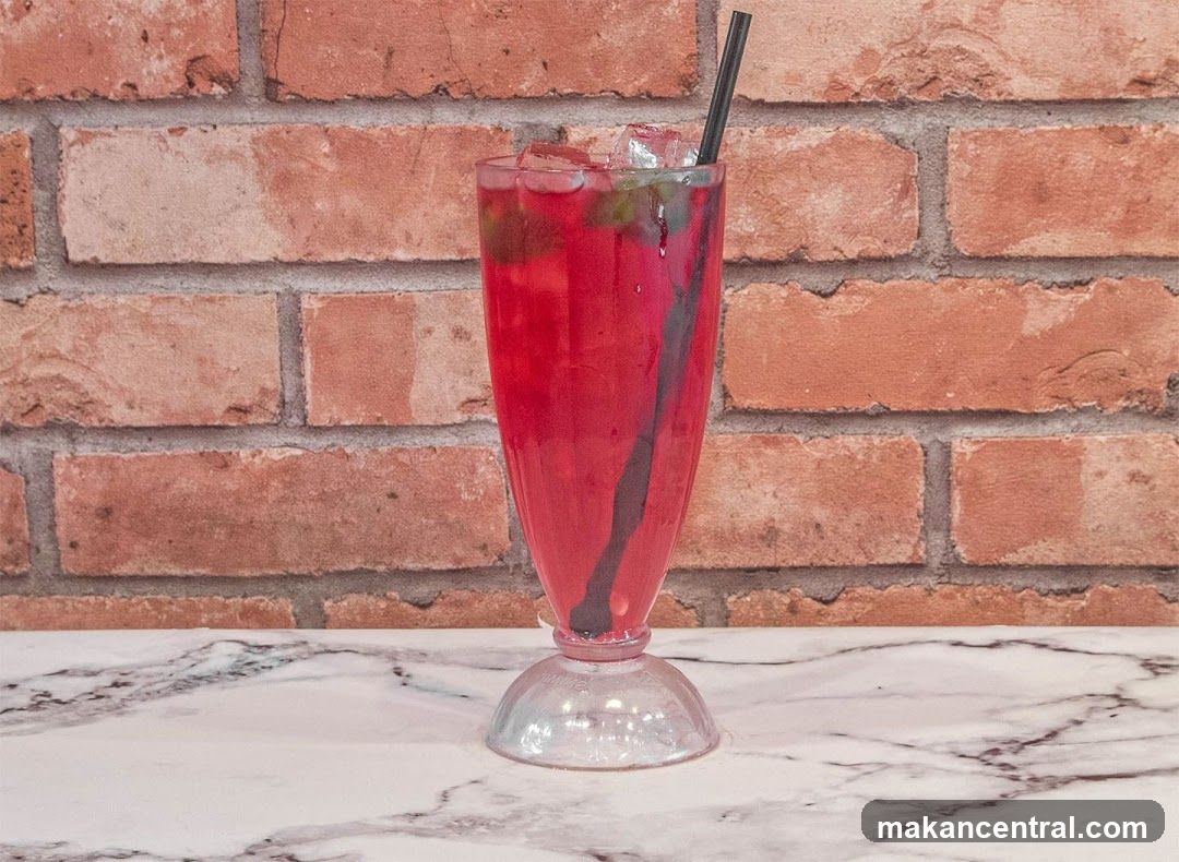 Red beverage on marble surface