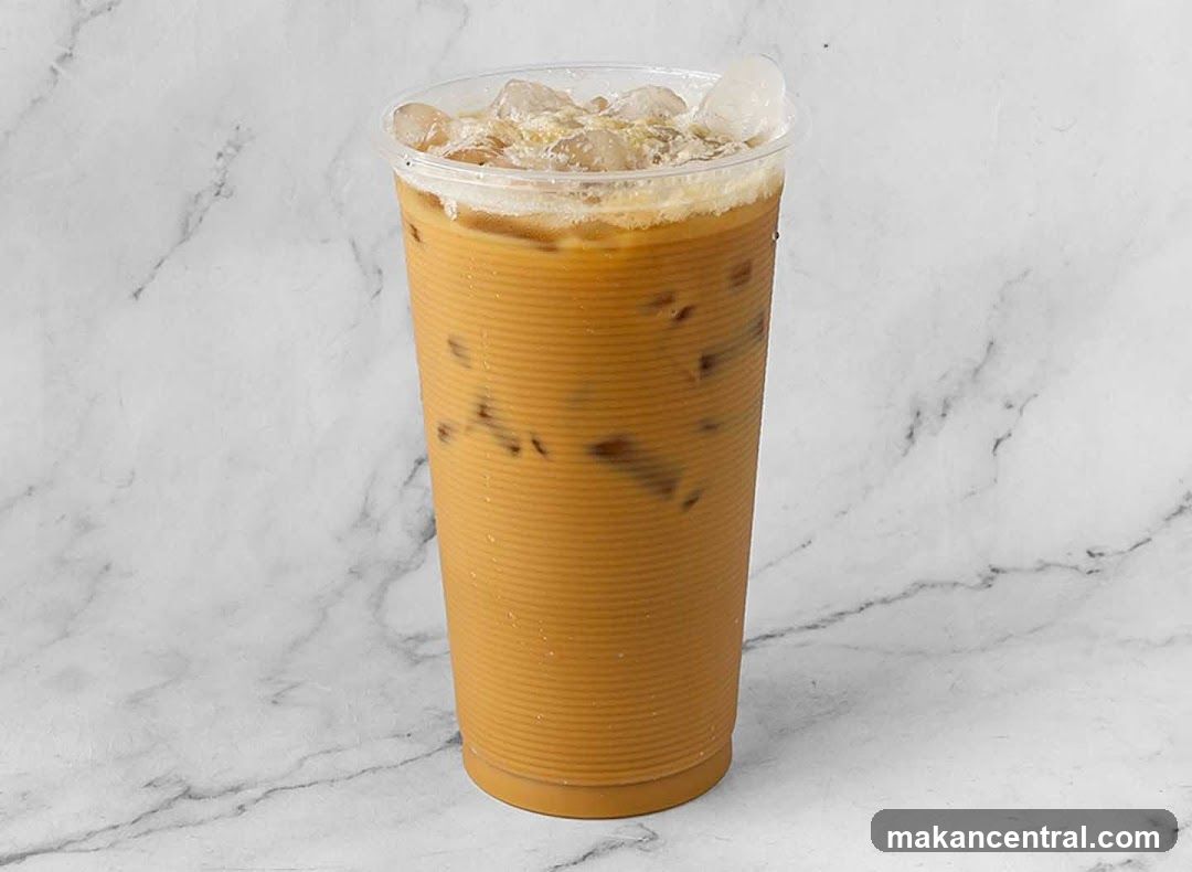 Iced beverage in plastic cup