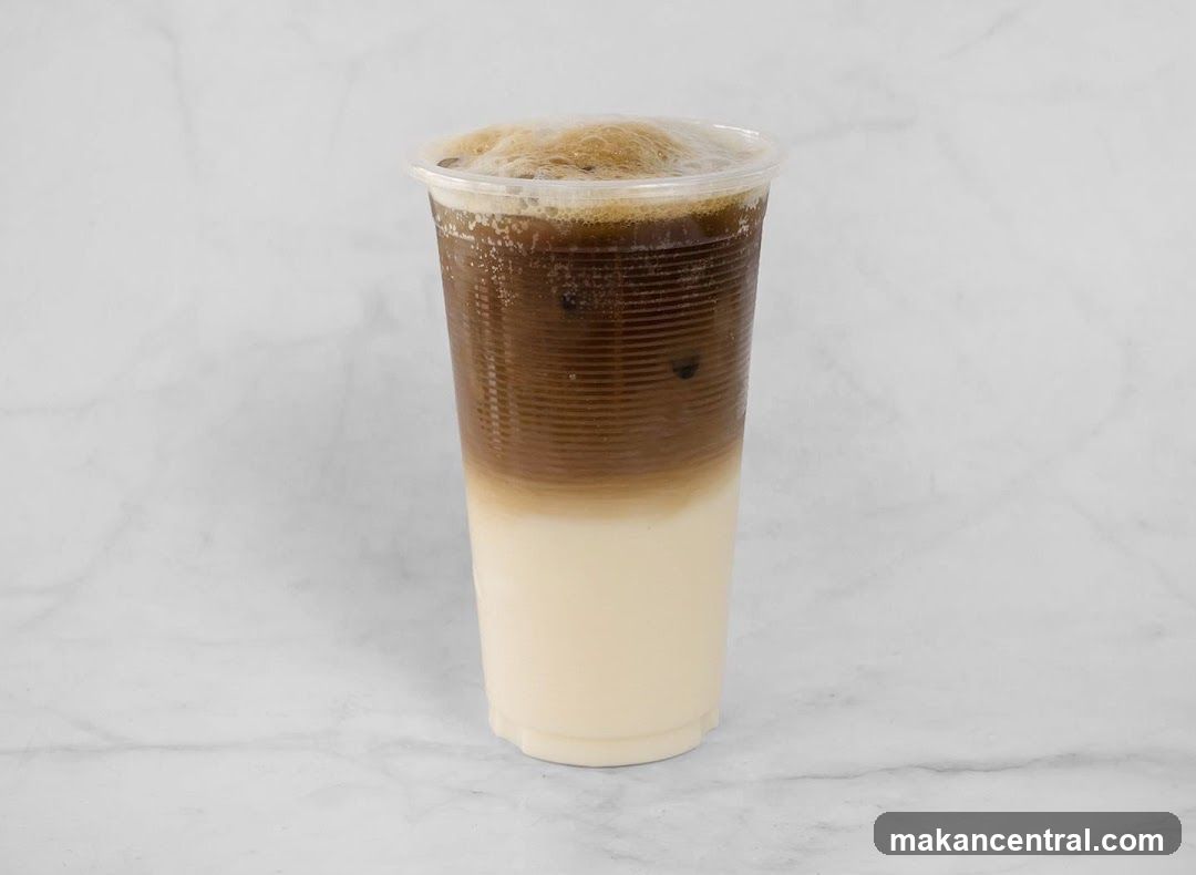 Iced beverage in plastic cup