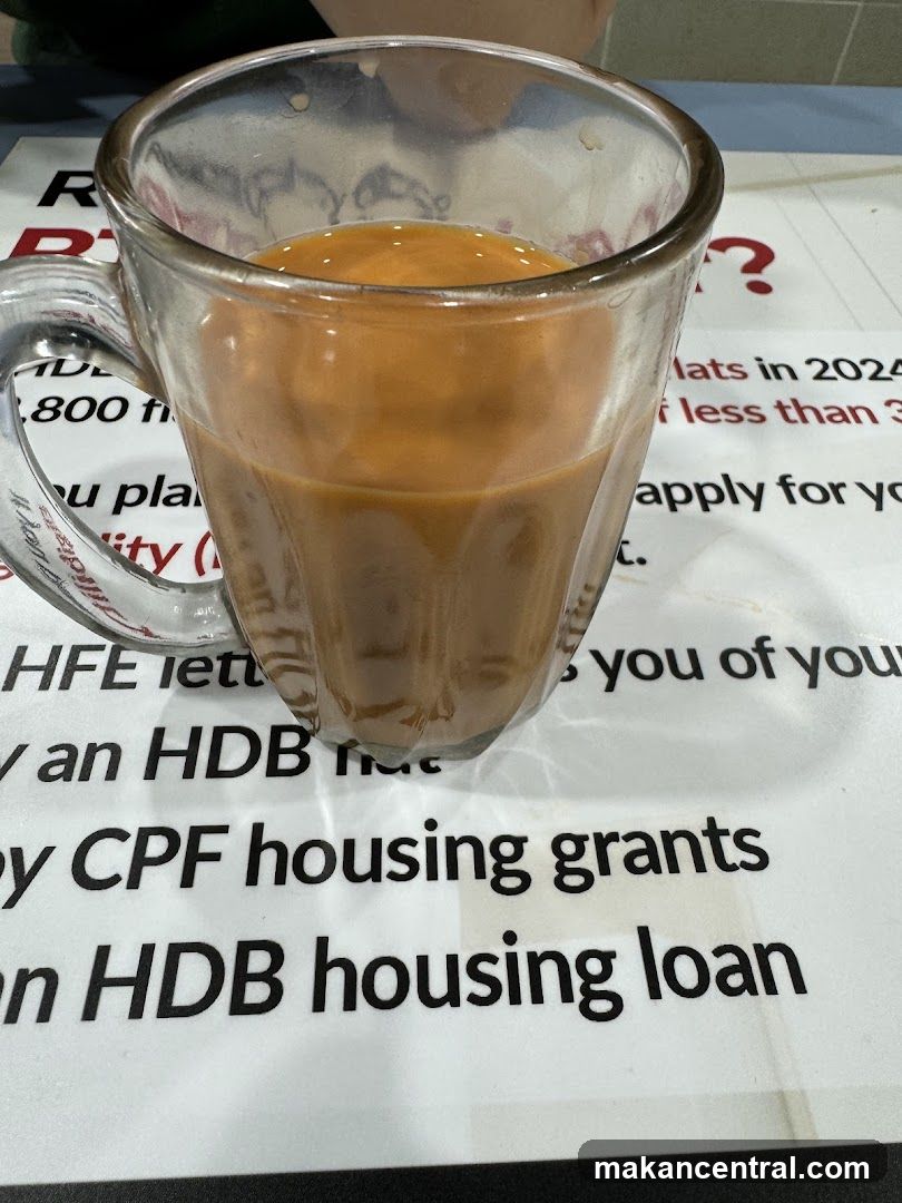 Cup of beverage on printed material