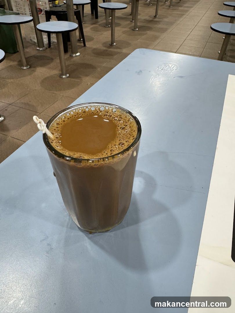 Cup of beverage on table