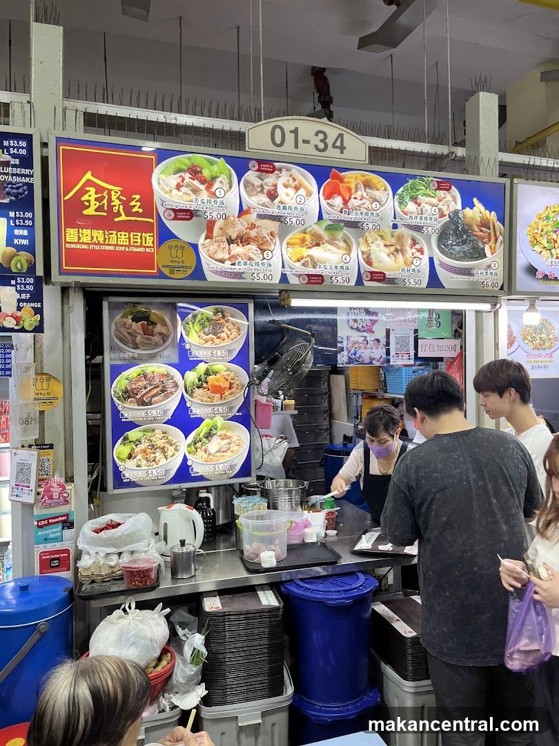 Food stall interior with customers and staff